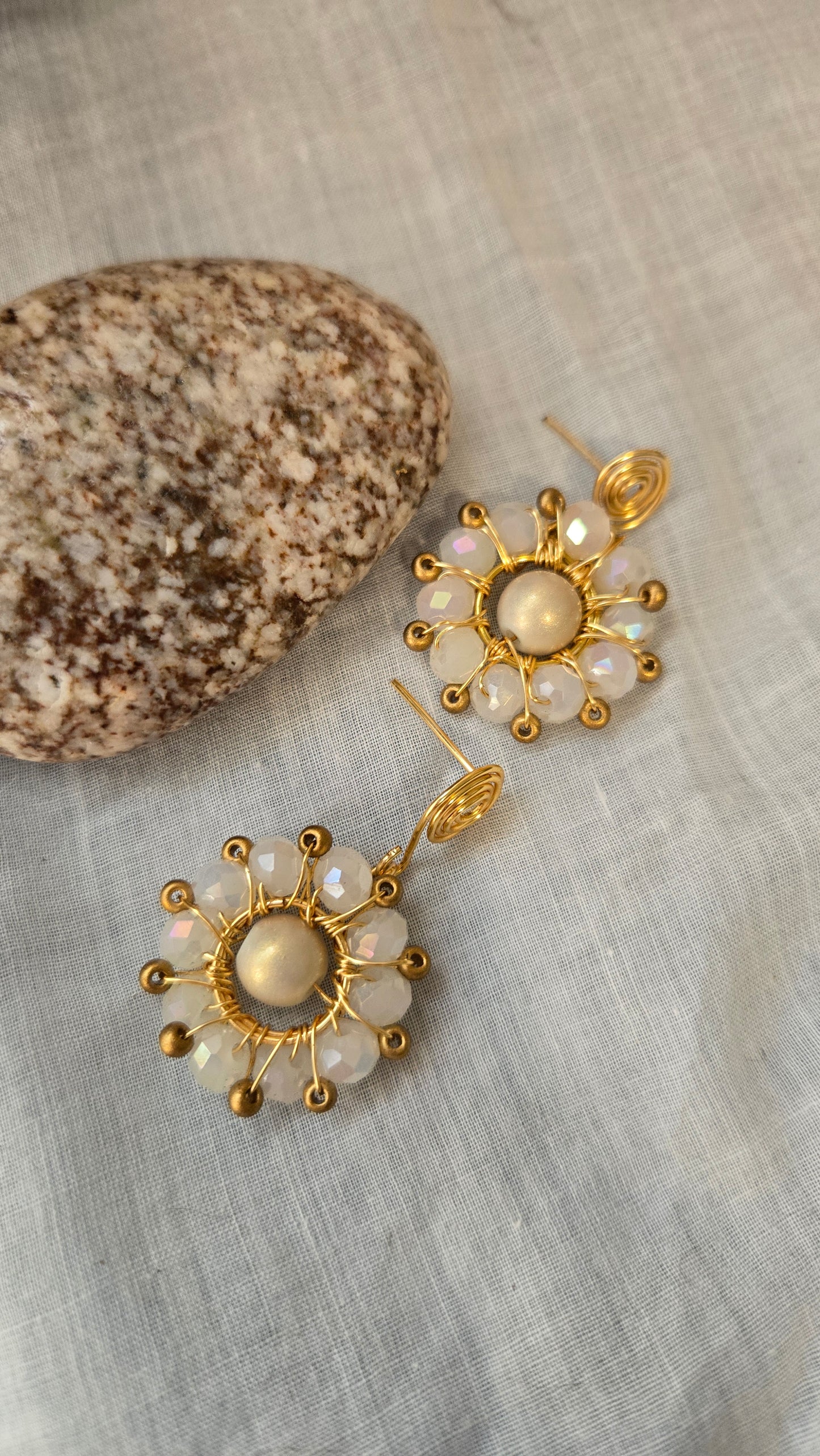 White and gold wire wrapped drop earrings