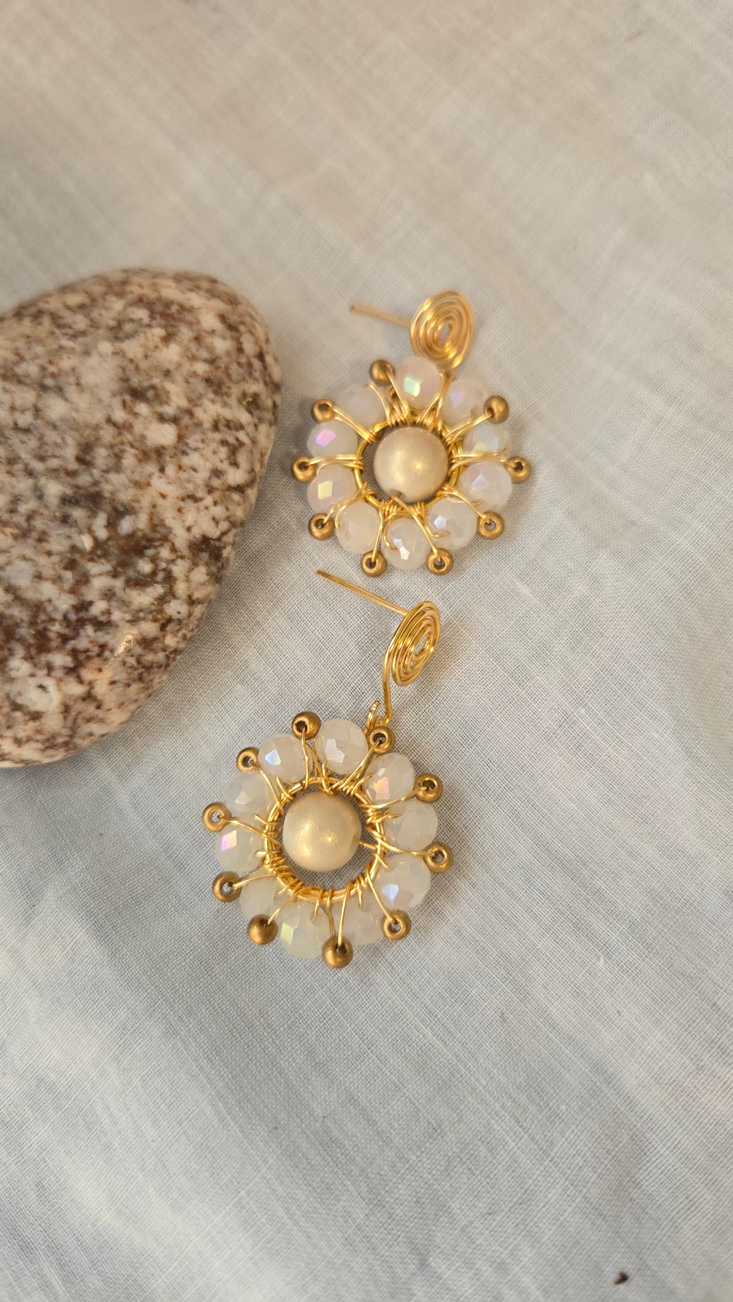 White and gold wire wrapped drop earrings