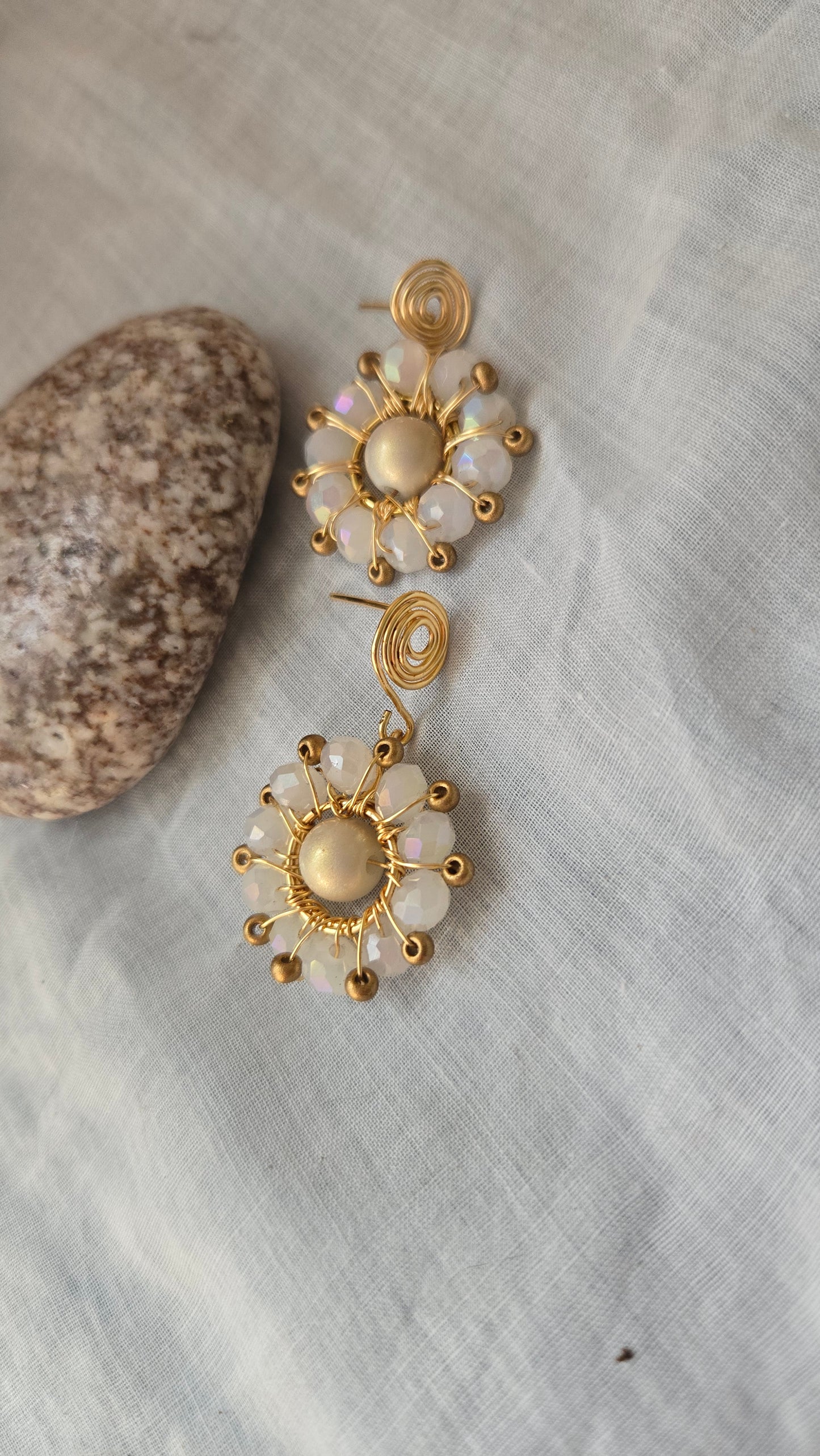 White and gold wire wrapped drop earrings